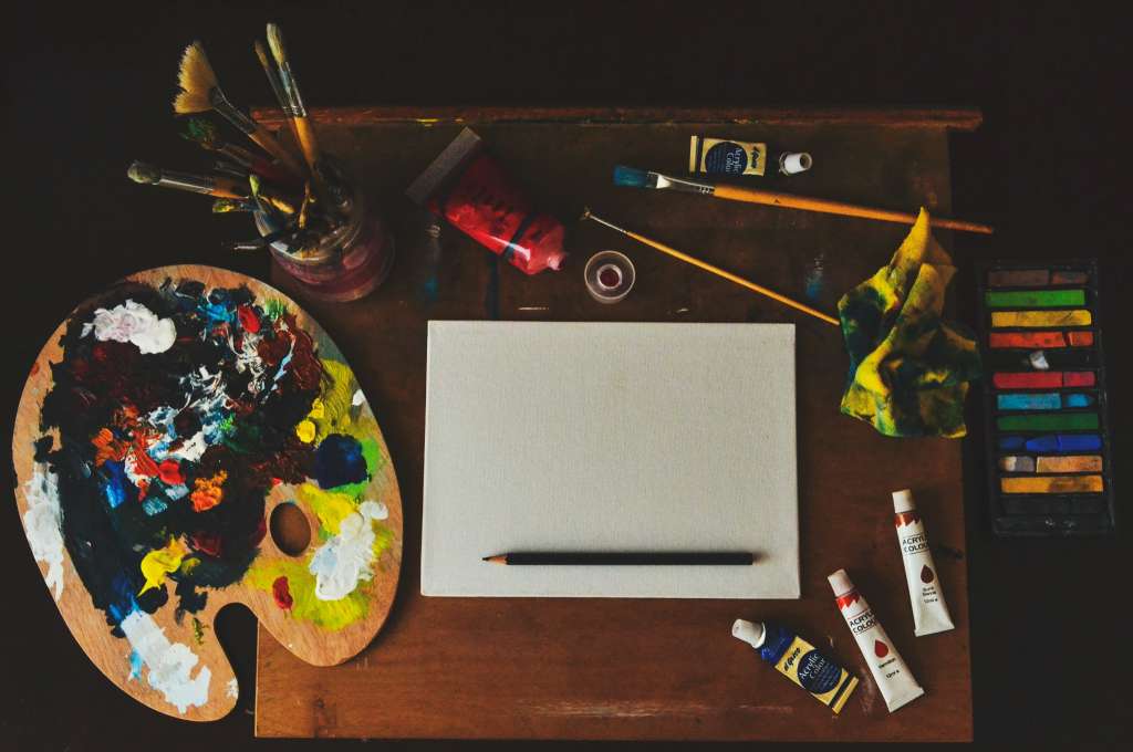 Assorted art supplies on a table